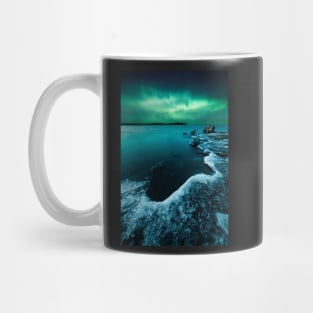 Ice on the lake shore and northern lights landscape Mug